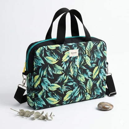 Bolso laptop hojas tropicales verde negro 15" Encantos - vista frontal fondo blanco