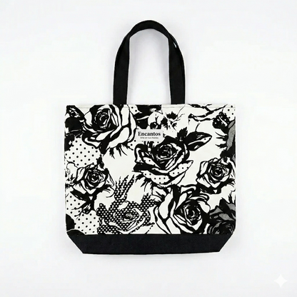 Bolsa Tote Rosas Noir | Encantos con diseño en blanco y negro de rosas estilizadas, asas negras y base reforzada, ideal para uso diario con estilo elegante.