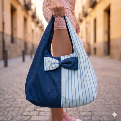 Detalle del bolso hobo con lazo bicolor