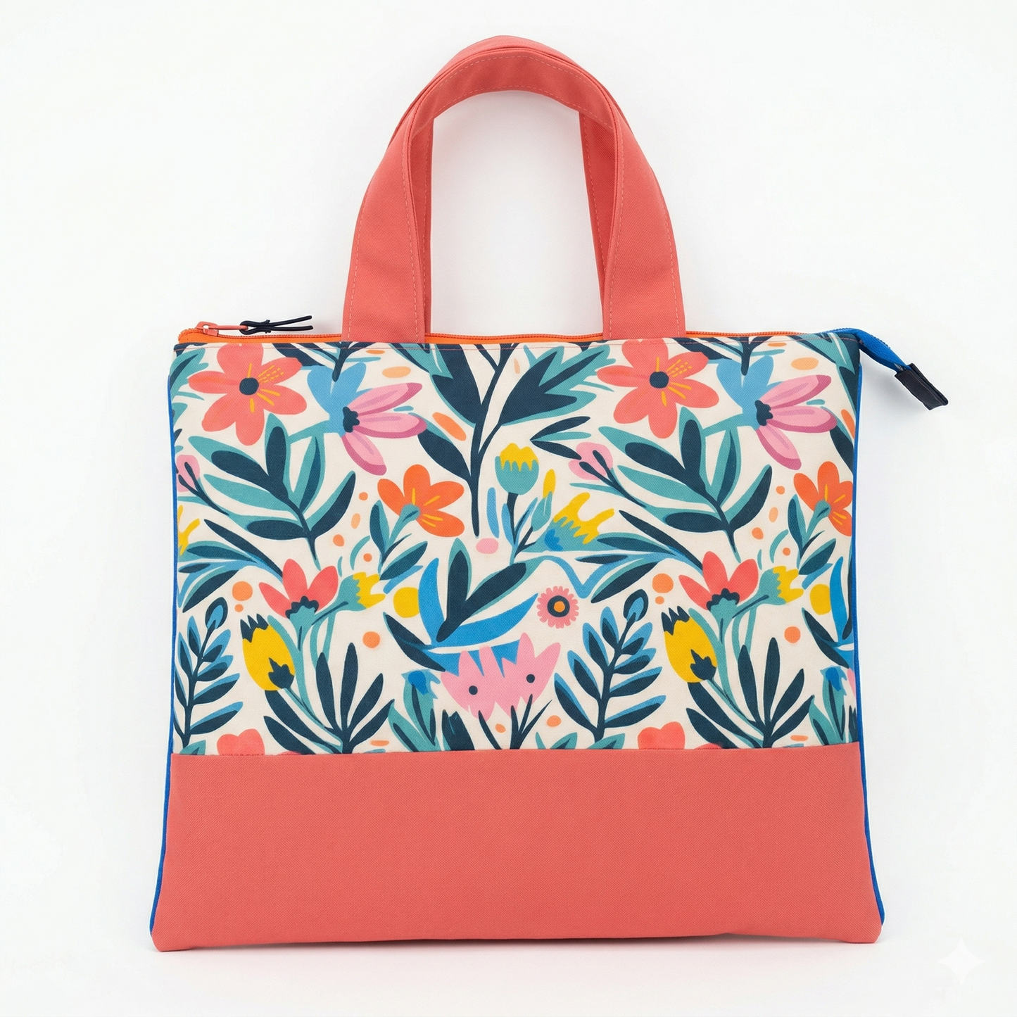 Bolso Tote Floral con Volante con diseño colorido de flores y hojas, asas anchas en tono coral, ideal para uso diario y ocasiones casuales.