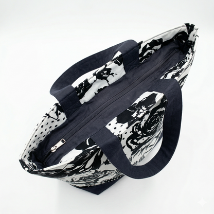 Bolsa Tote Rosas Noir | Encantos con diseño en blanco y negro, cierre con cremallera y asas resistentes para uso diario.